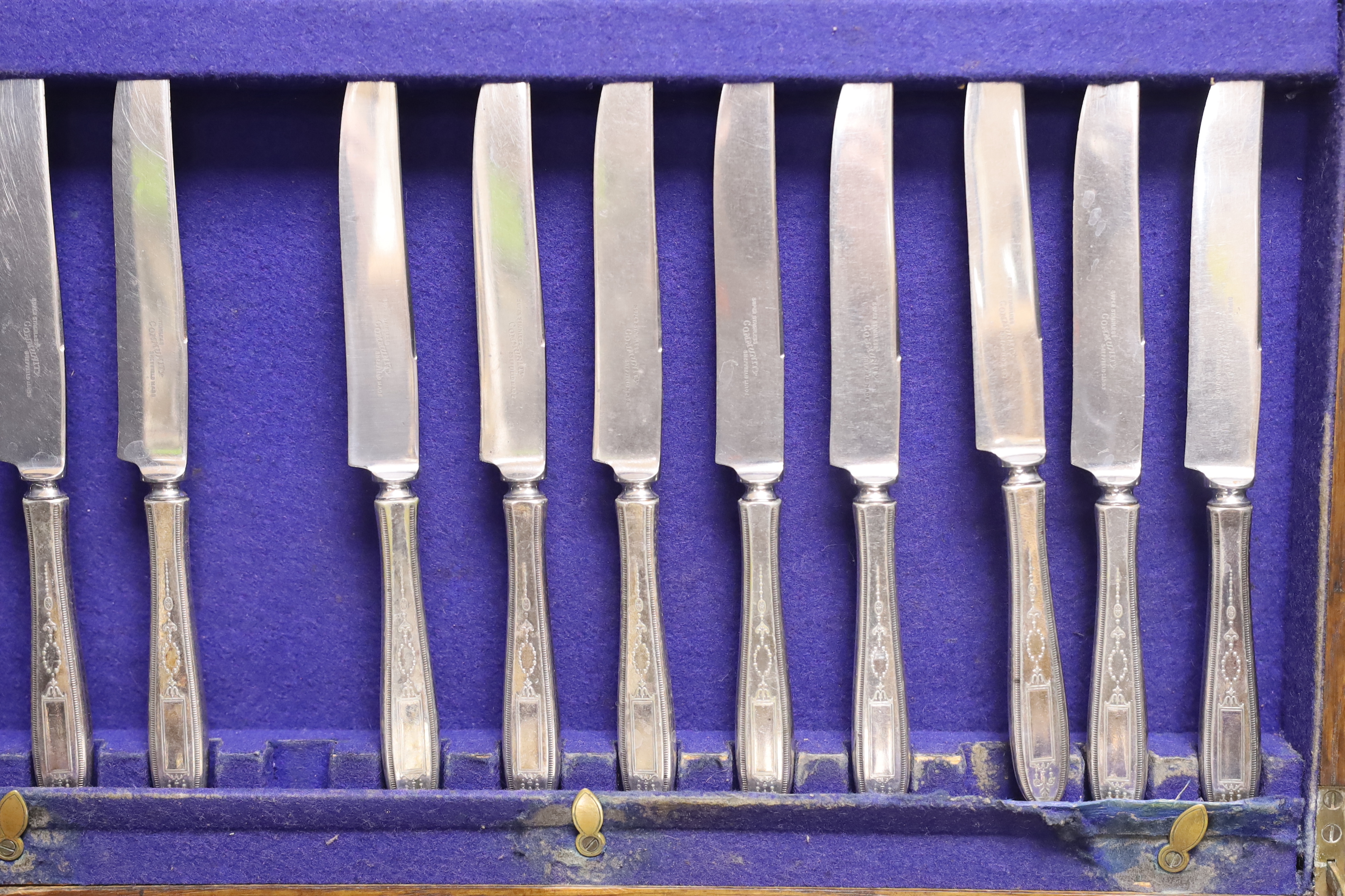 An oak cased canteen of plated cutlery, twelve place settings, 45 x 35 x 23.5cm